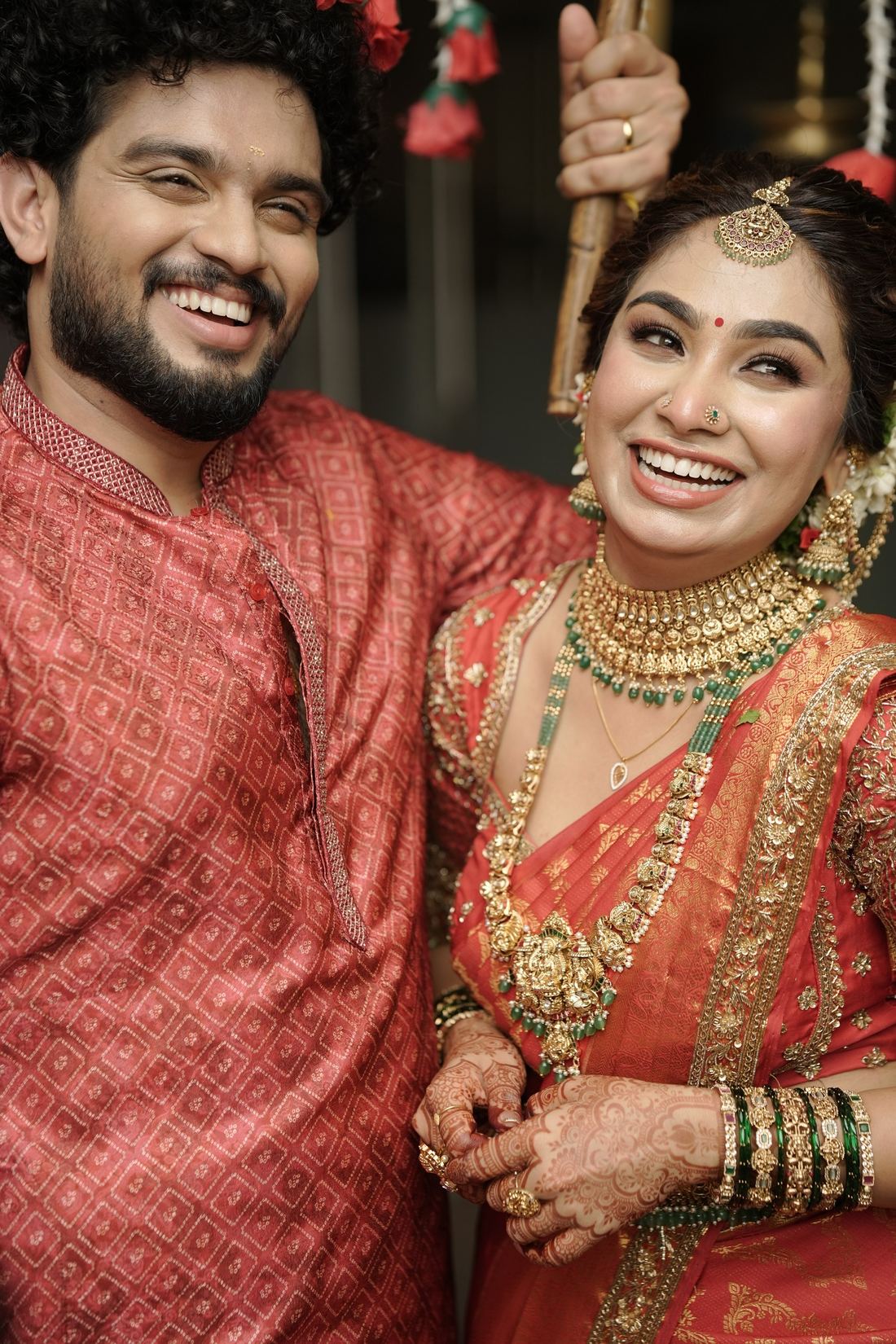Bride and groom laughing together